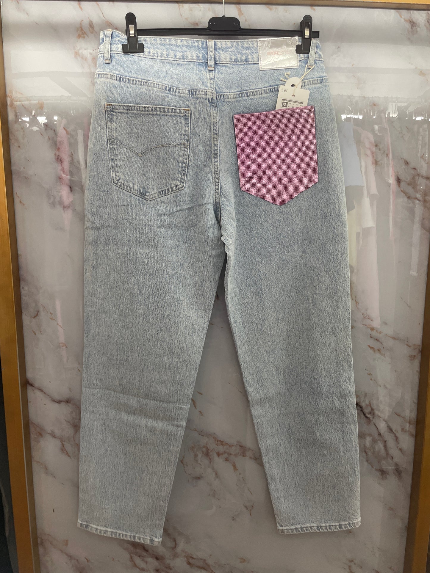 Jeans tasca rosa