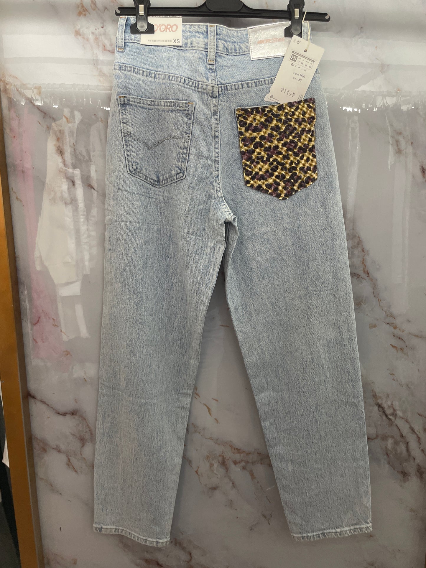 Jeans tasca leopardata