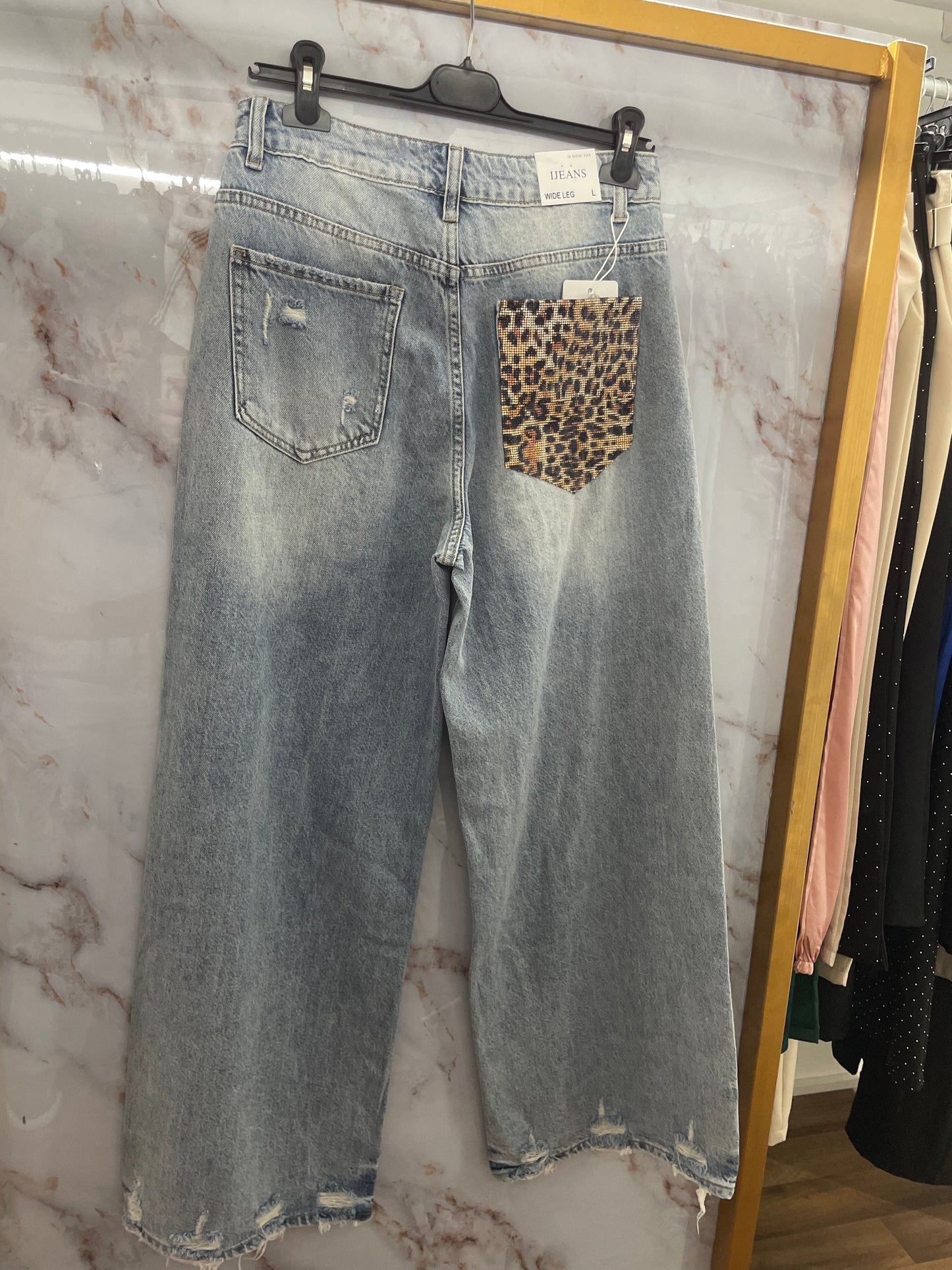 Jeans tasca leopardata